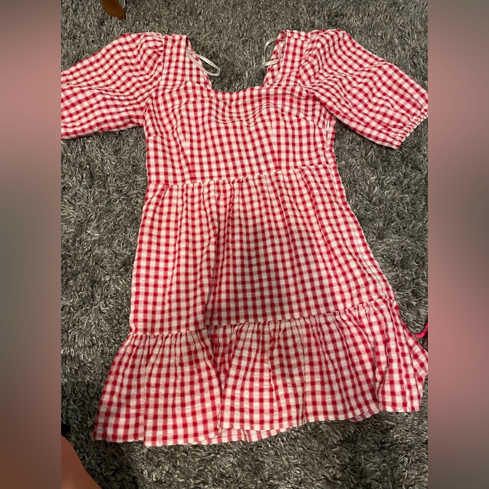 Red and white dress ties in the back